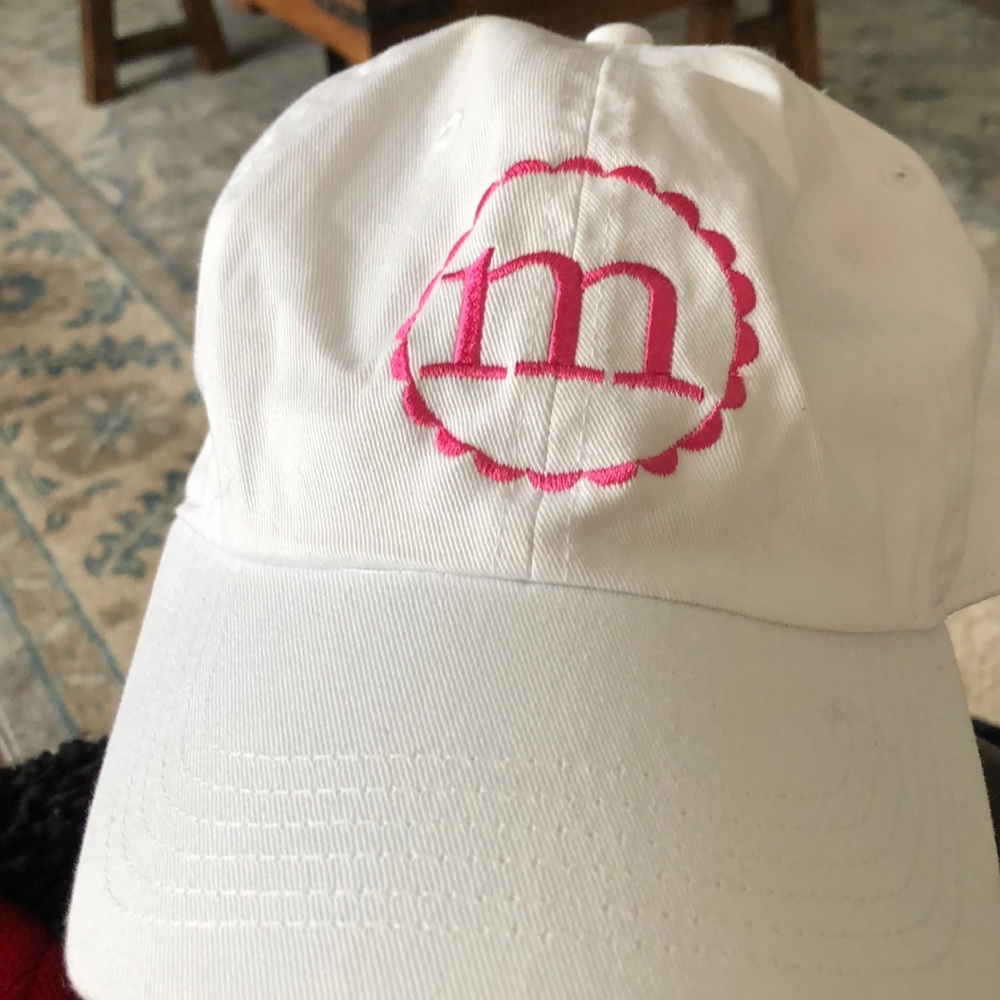 White and pink “M” hat